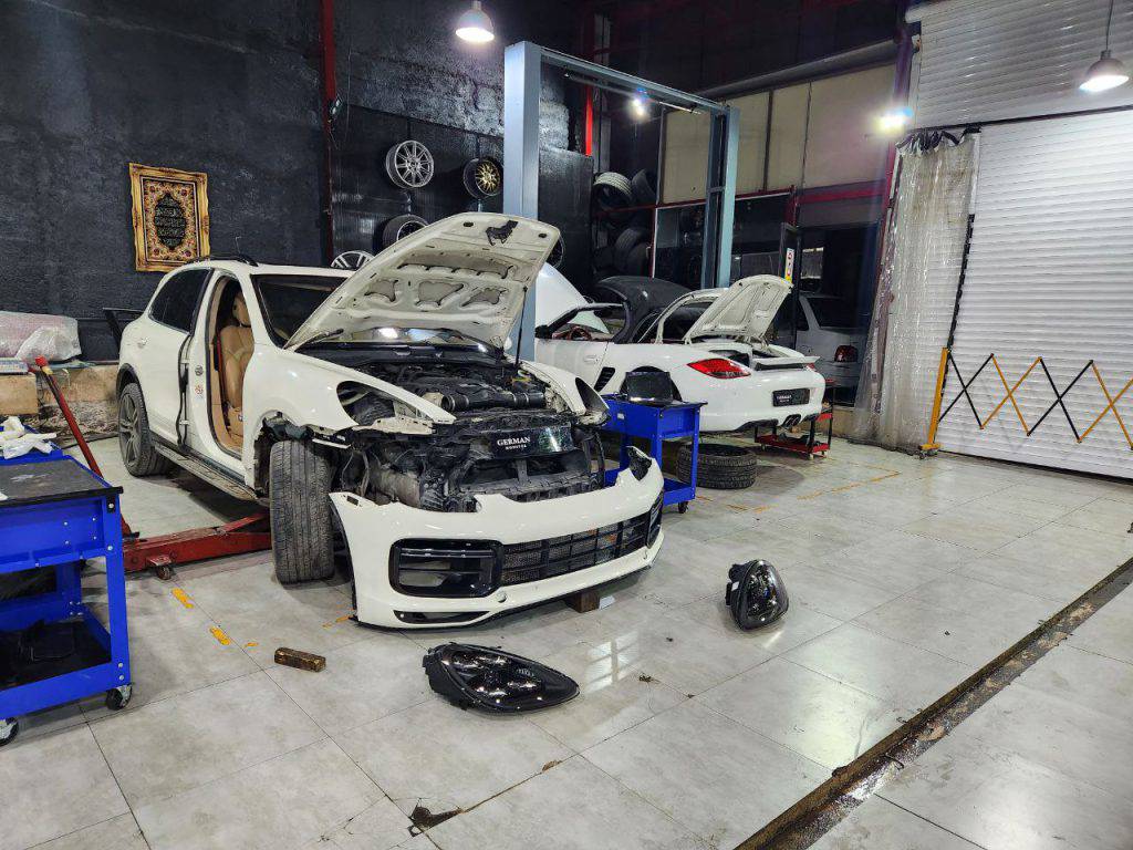 (نمایندگی تعمیرات خودروهای پورشه معین خودرو(معین موتور